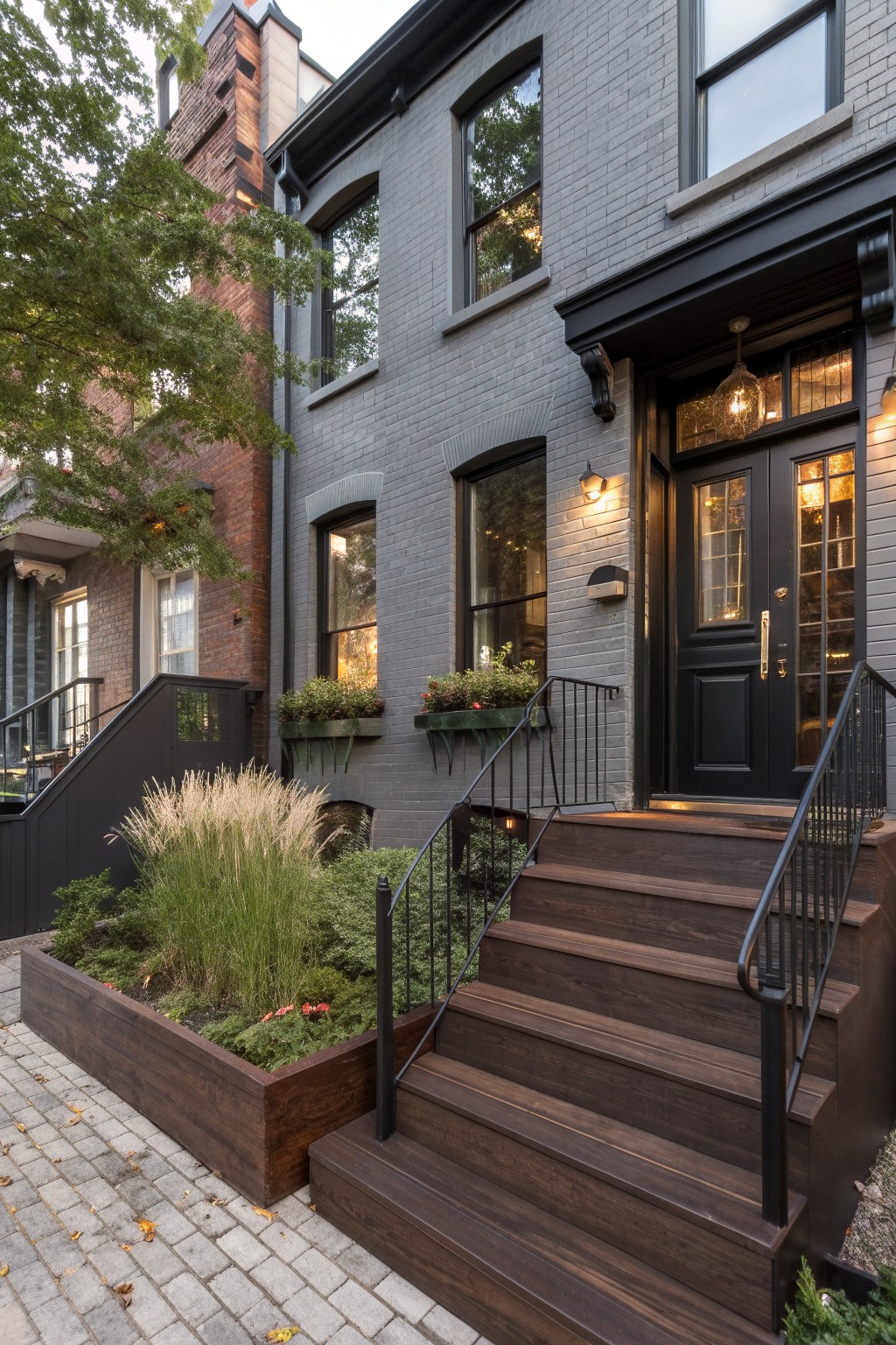 Dark Wood Entry Stairs on Gray Brick