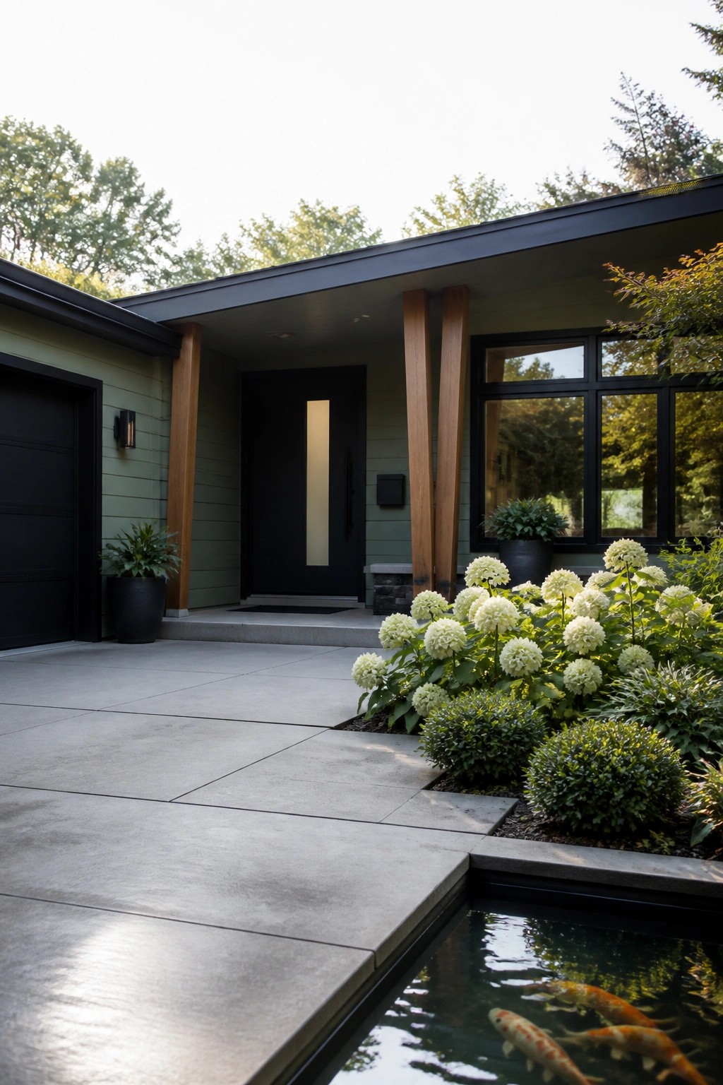 Modern house entrance with black door, white hydrangeas, wooden pillars, and koi pond.