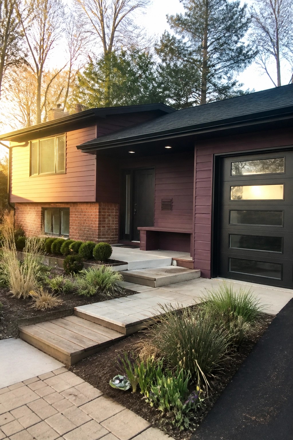 A two-story house with deep purple horizontal lap siding on the upper and right sections, brick on the lower left, a black garage door, and a concrete entry with steps.